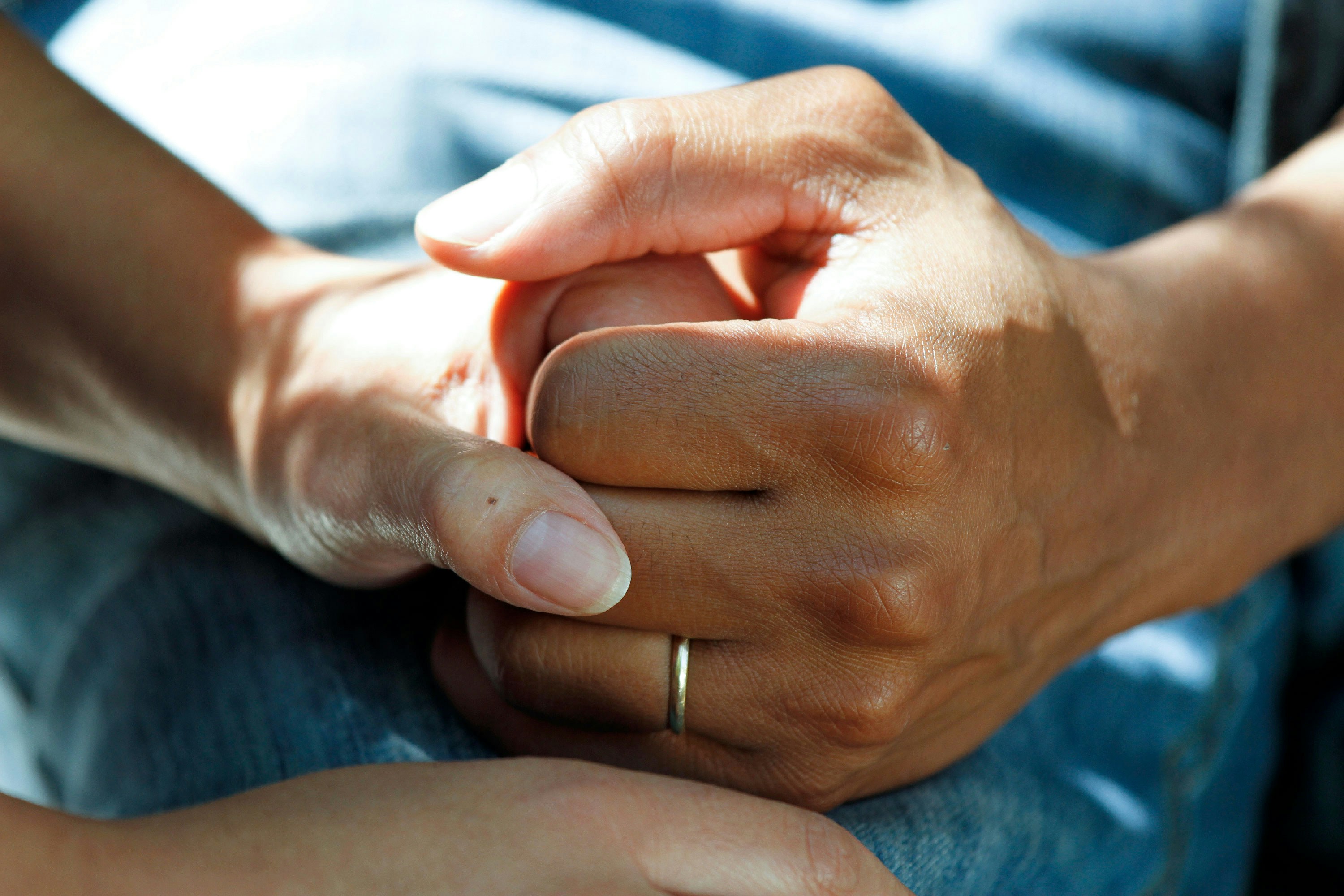 Hands holding, symbolizing care and connection